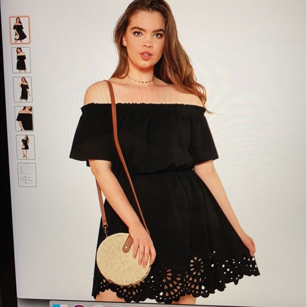 Black off the shoulder dress.